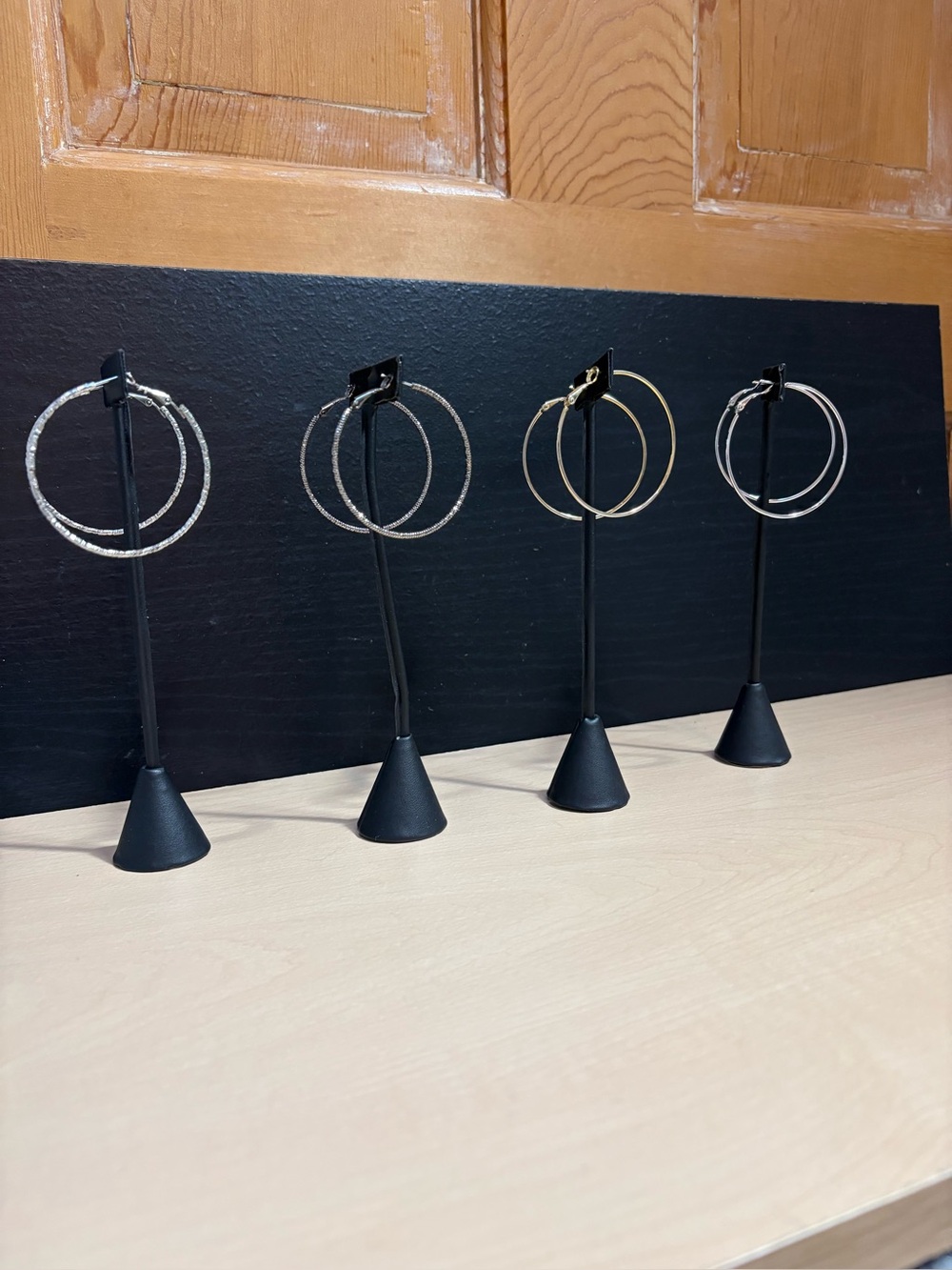 Assortment of 2” hoops: silver, textured silver, gunmetal & gold filled.